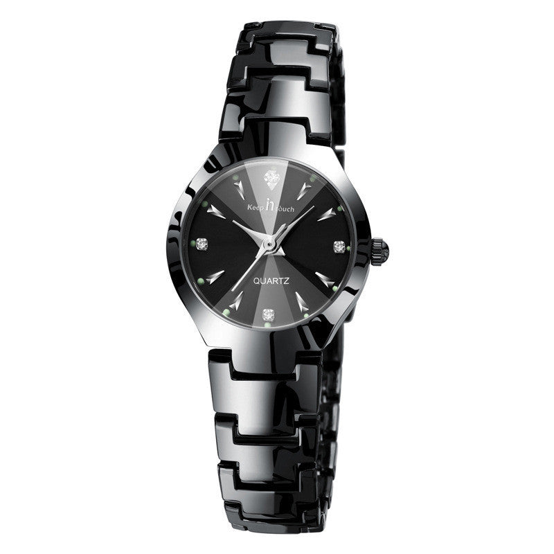 Black quartz watch with diamond accents.