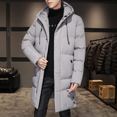A gray parka jacket with a hood and a zippered front. The parka is worn over a black shirt and jeans.