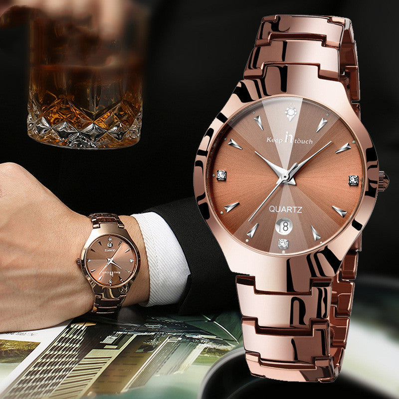 Rose gold quartz watch with a brown face and diamond accents.
