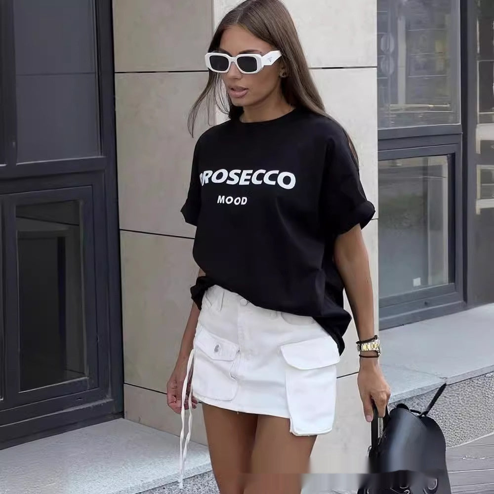 A model showcases wearing a black shirt with "PROSECCO MOOD" text printed on the front.